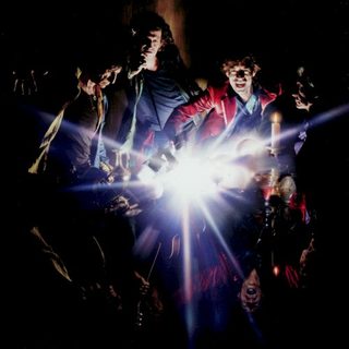 A Bigger Bang — Musicians around a central light front